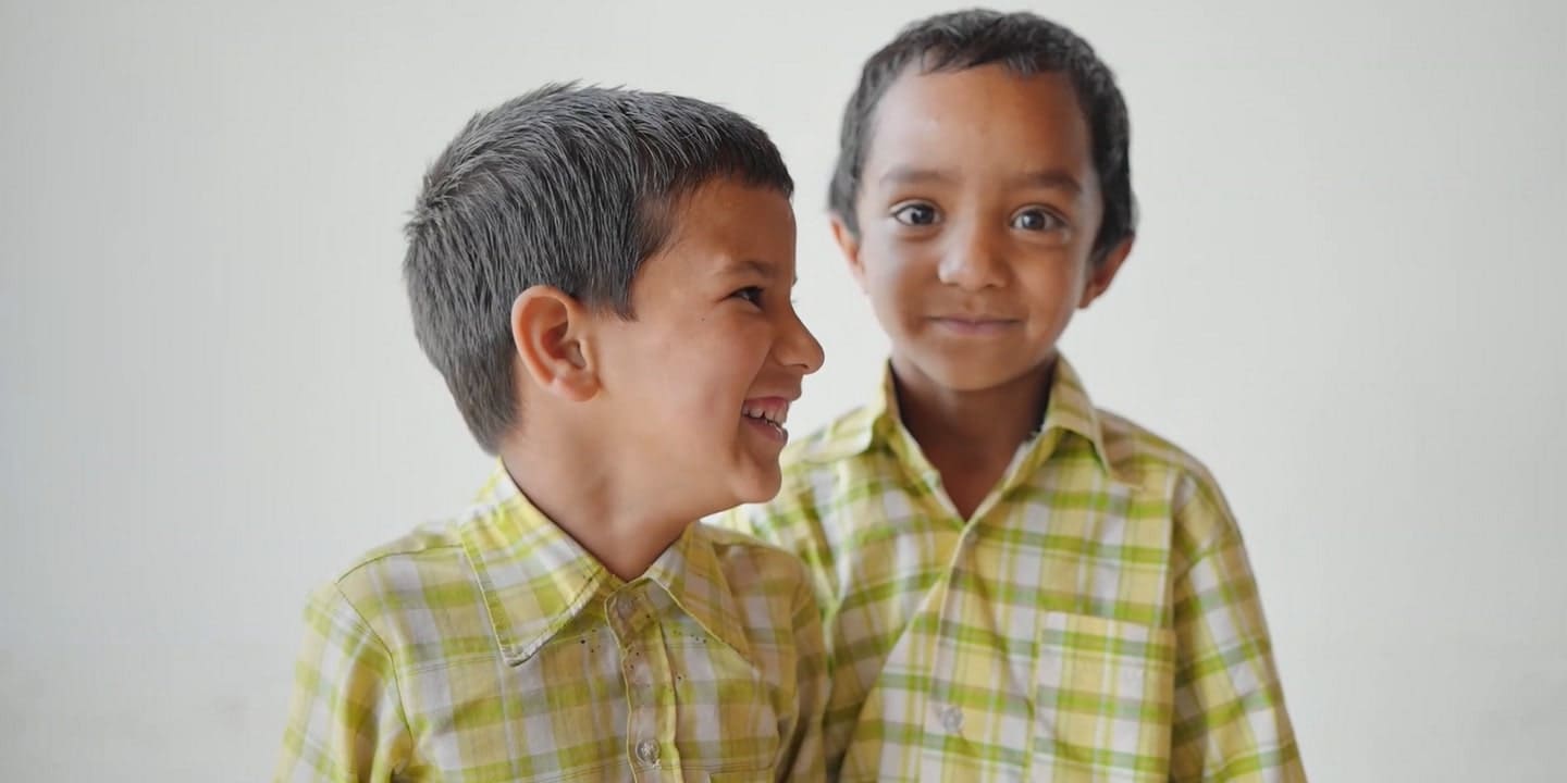 two students smiling
