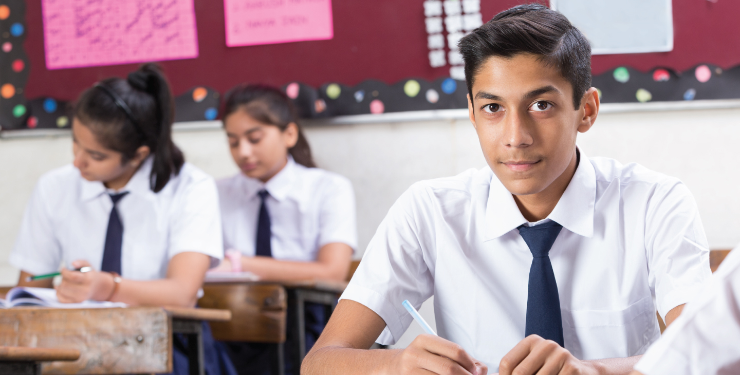 A senior school boy in Indian classroom