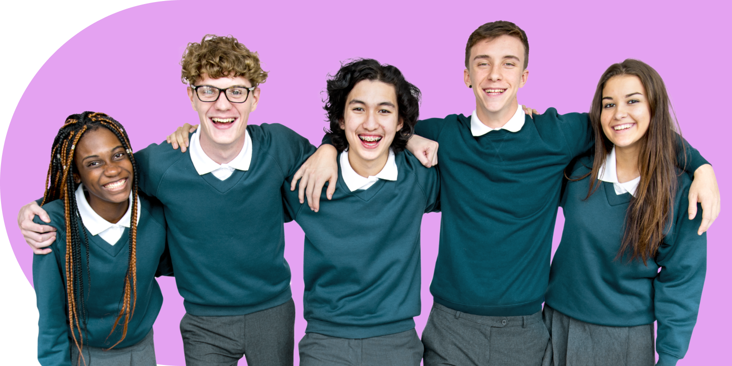 Image of a group of teenage students wearing school uniform standing in a line with their arms around each other's shoulders.