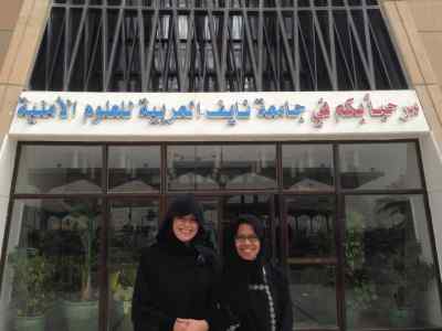Alumna Ms Fitriana Nur (right) and colleague working for the International Organisation for Migration (IOM) in Saudi Arabia, advocating for policy change to protect of migrant workers from trafficking.
