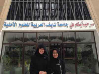 Alumna Ms Fitriana Nur (right) and colleague working for the International Organisation for Migration (IOM) in Saudi Arabia, advocating for policy change to protect of migrant workers from trafficking.