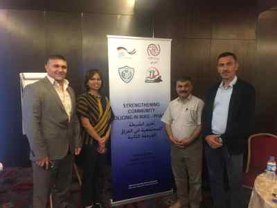 Ms Fitriana Nur and colleagues in Iraq. Ms Nur training staff on a community policing approach in addressing vulnerability of women and girls to gender based violence.