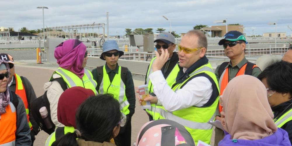 Indonesian fellows visiting an Australian water facility.